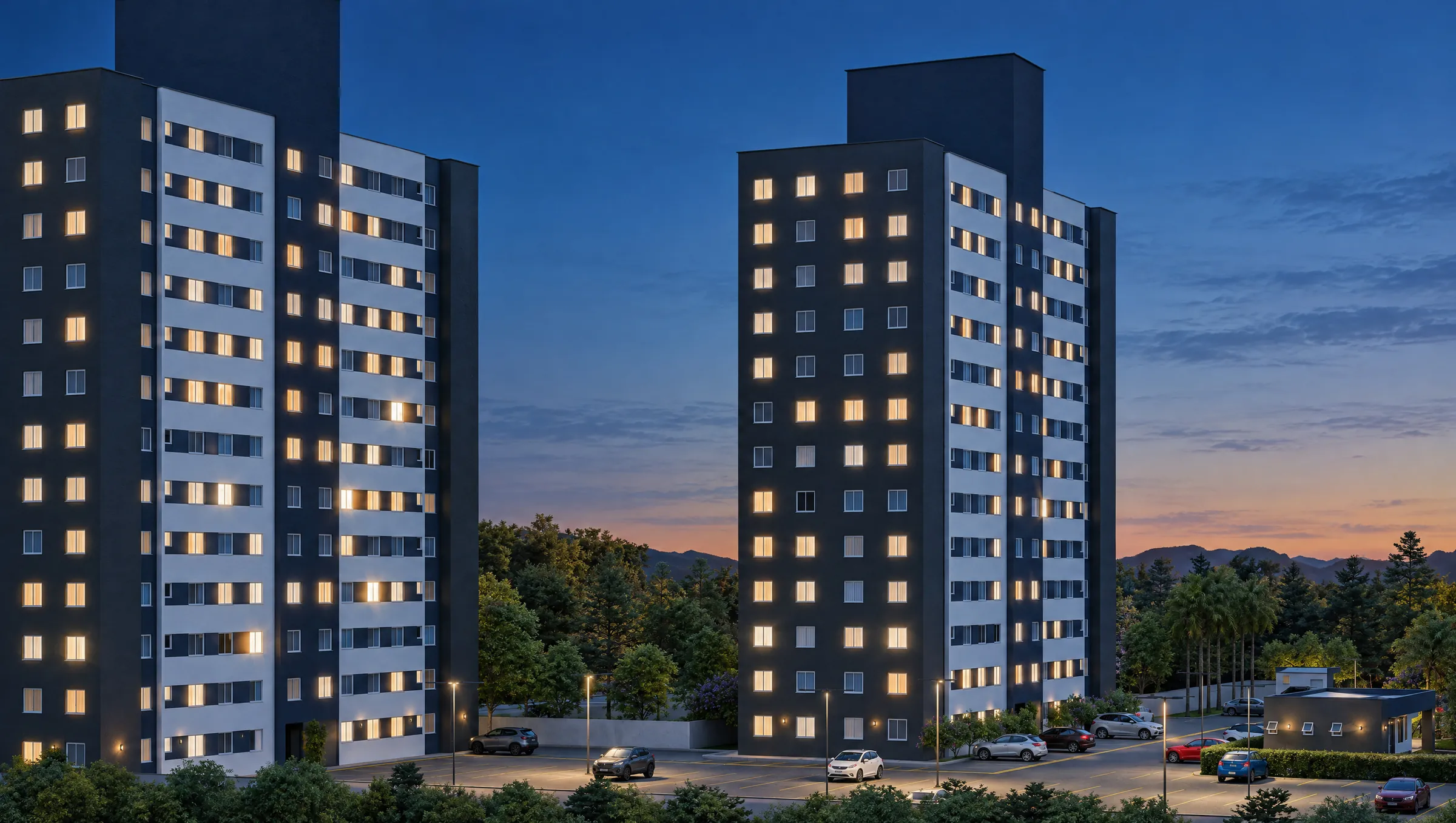 Perspectiva das duas torres do Residencial Las Palmas ao anoitecer, no Mato Grande, em Canoas